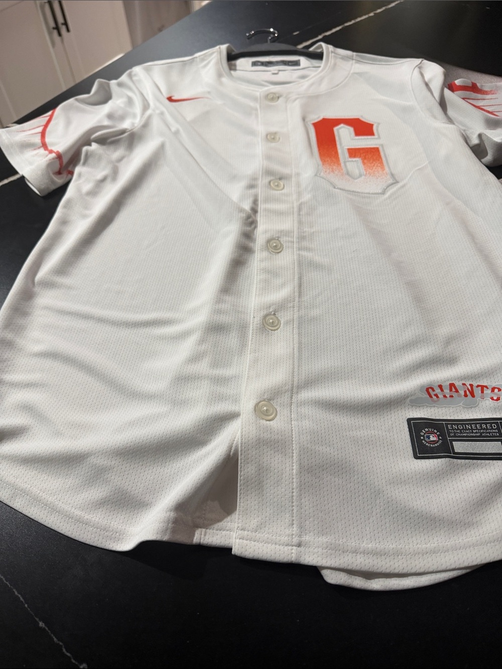 Nike Kids White Jersey with Orange 'G' Logo